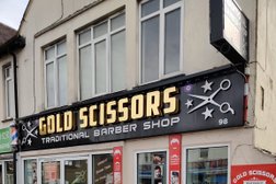 Golden scissors Photo