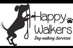 Happy walkers dog walking Photo