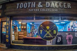 Tooth & Dagger Tattoo Photo
